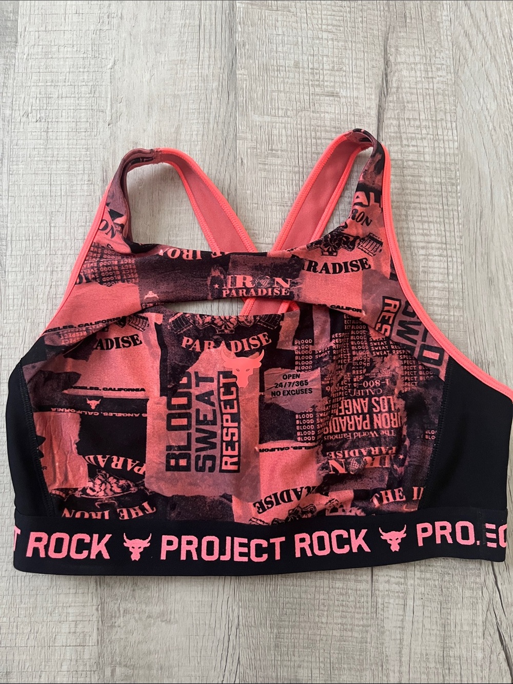 Under Armour Project Rock Coral Pink Sports Bra | Peekaboo Front